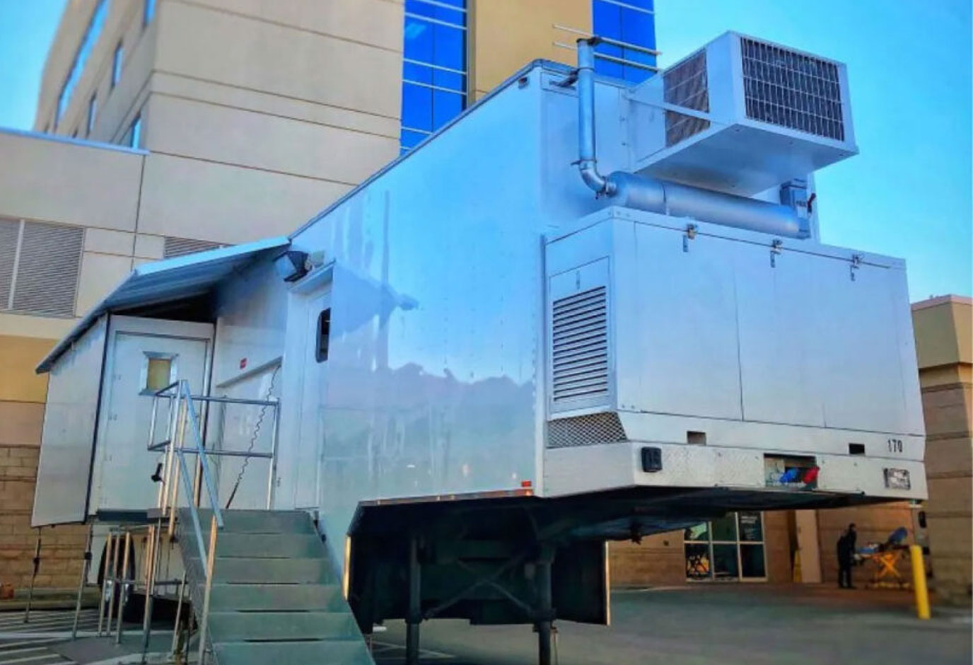 Modular Devices cath lab in front of hospital.